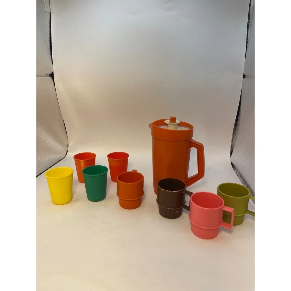 1970 vintage Tupperware  Toys  10 Piece;Orange pitcher with lid 4 cups 4 glasses